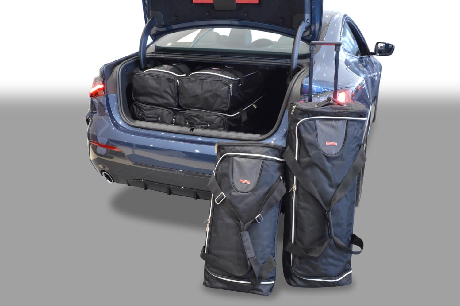 b15501s-bmw-4-serie-coupe-g22-2020-car-bags-1.jpg Reistassenset geschikt voor BMW 4 Serie Coupé (G22) 2020-heden Original - Afbeelding 1
