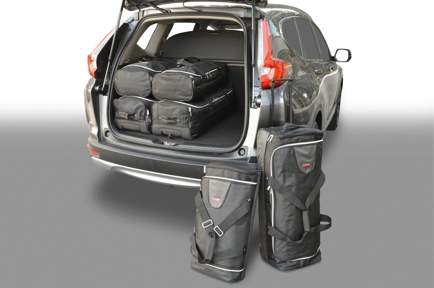 h20201s-honda-cr-v-2018-car-bags-1.jpg Reistassenset geschikt voor Honda CR-V V 2018-2023 Original - Afbeelding 1