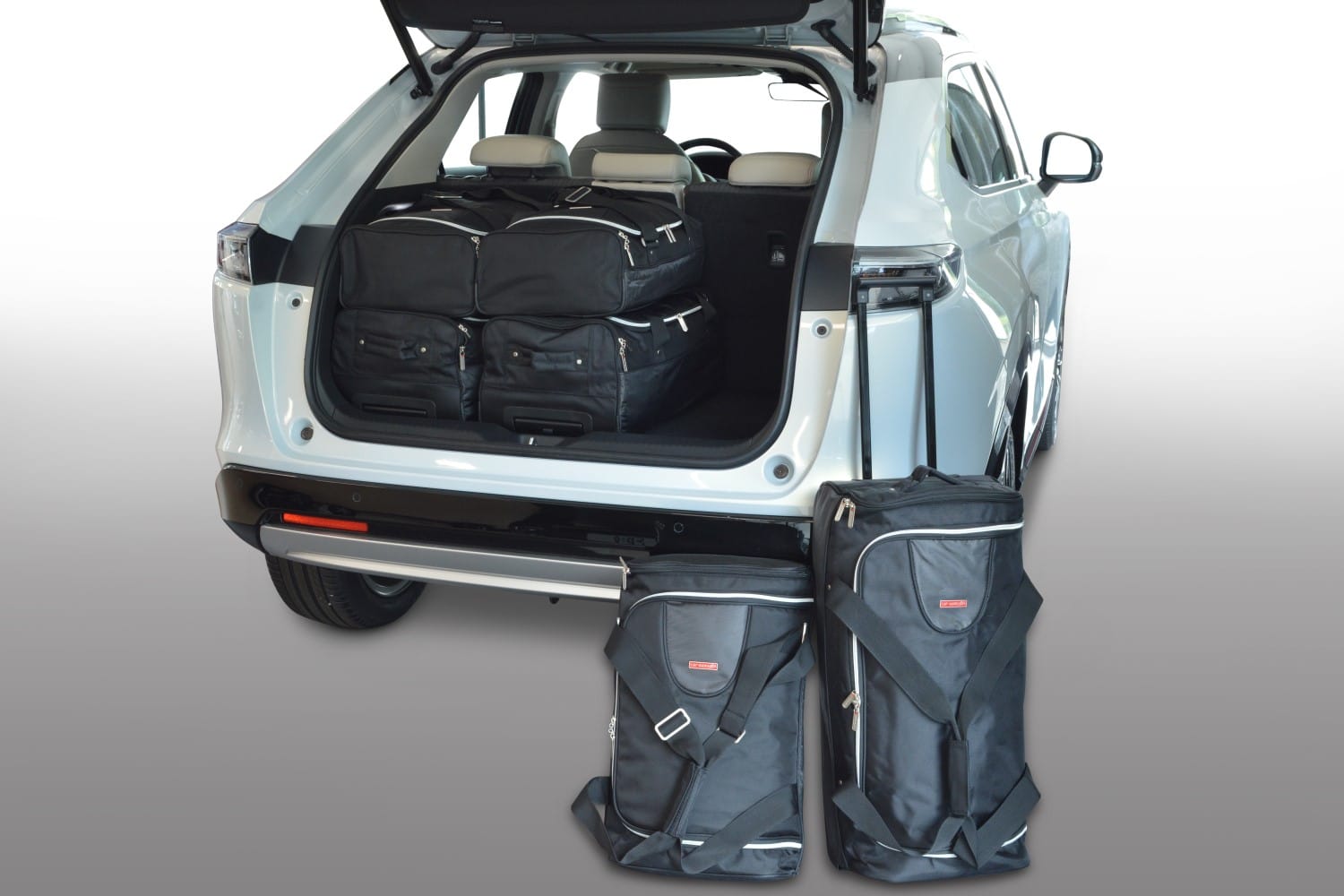 h20301s-honda-hr-v-ehev-2021-car-bags-1.jpg Reistassenset geschikt voor Honda HR-V (RV) 2021-heden Original - Afbeelding 1