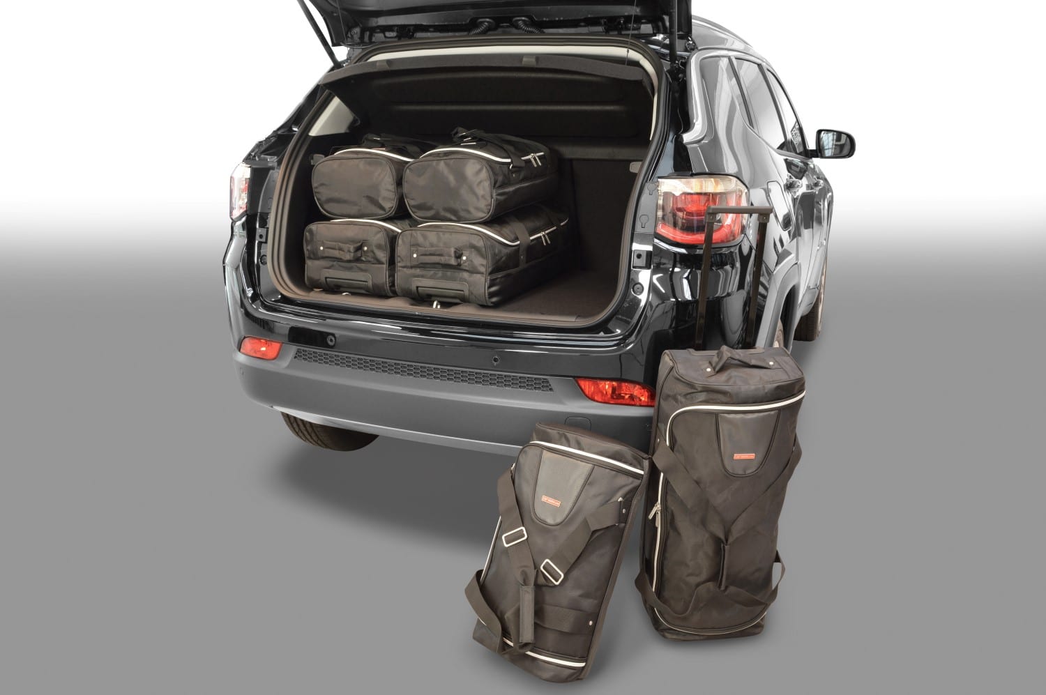 j10301s-jeep-compass-mp-2017-car-bags-1.jpg Reistassenset geschikt voor Jeep Compass (MP) 2017-heden Original - Afbeelding 1