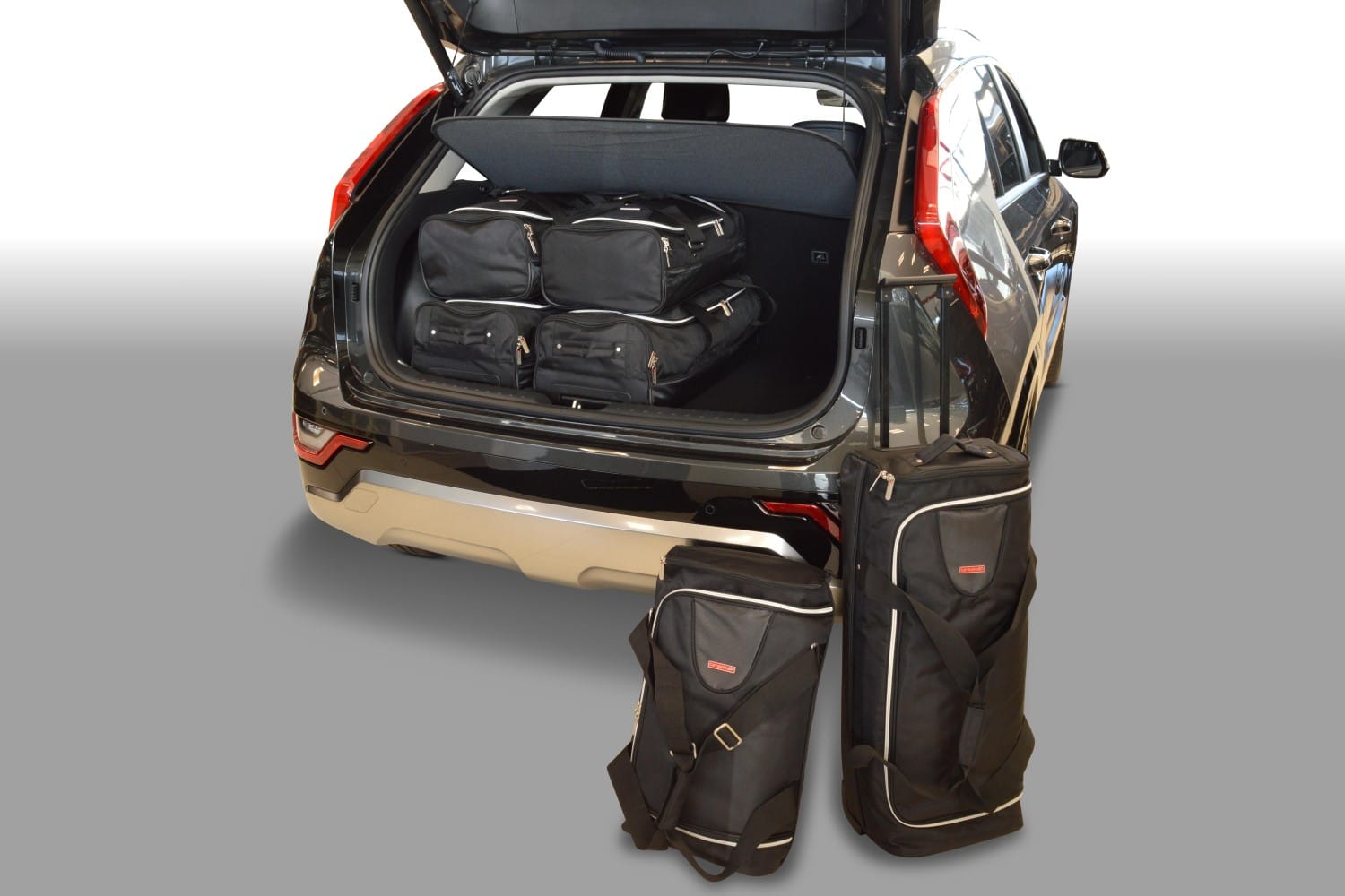 k12901s-kia-niro-ii-sg2-2022-car-bags-1.jpg Reistassenset geschikt voor Kia Niro II (SG2) 2022-heden Original - Afbeelding 1