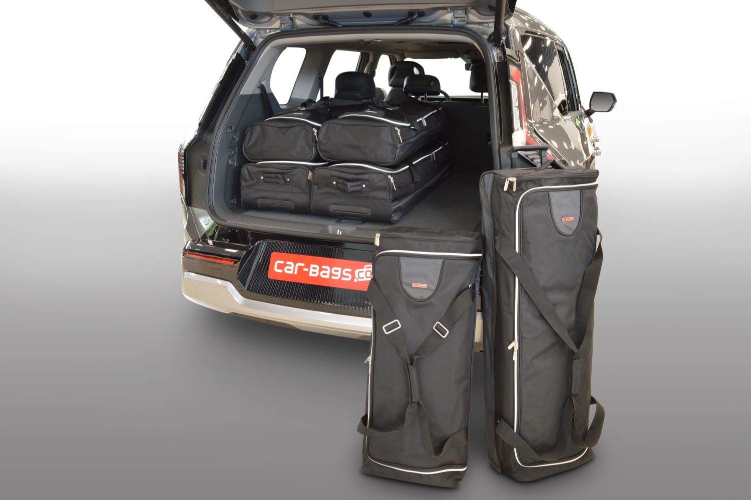 k13301s-kia-ev9-2023-car-bags-1.jpg Reistassenset geschikt voor Kia EV9 2023-heden Original - Afbeelding 1