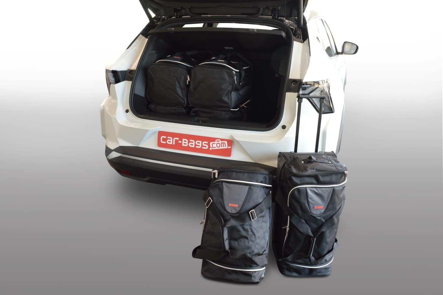 r12301s-renault-scenic-e-tech-2024-car-bags-1.jpg Reistassenset geschikt voor Renault Scénic E-Tech 2024-heden Original - Afbeelding 1
