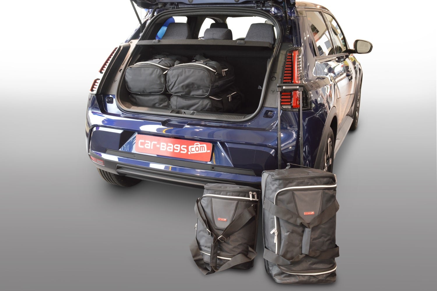 r12601s-renault-5-e-tech-a290-2024-car-bags-1.jpg Reistassenset geschikt voor Renault 5 E-Tech 2024-heden 5-deurs hatchback Original - Afbeelding 1